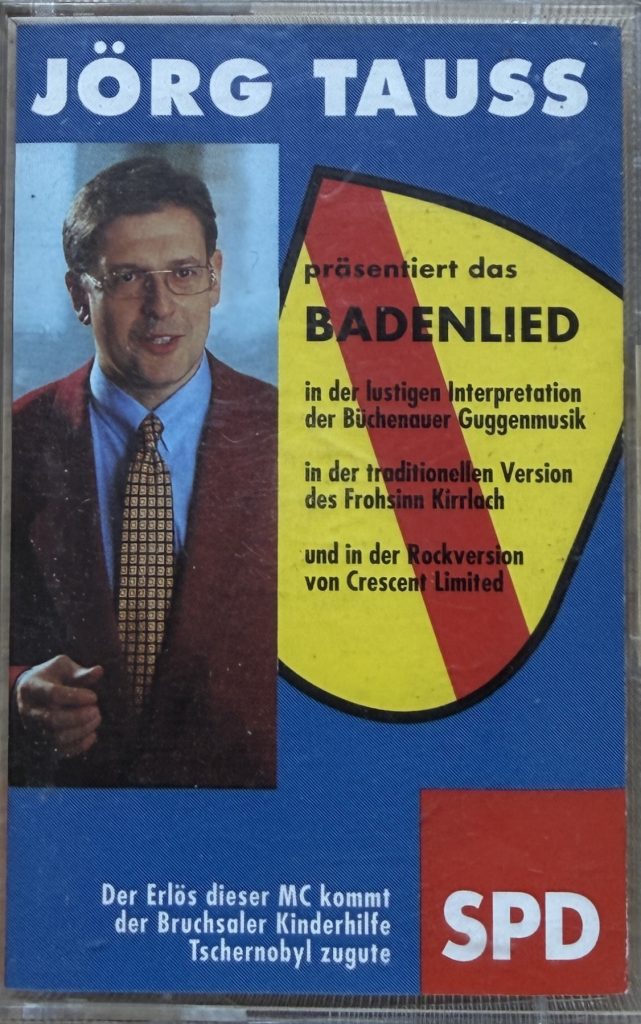 Jörg Tauss präsentiert das Badenlied in der lustigen Interpretation der Büchenauer Guggemusik - in der traditionellen Version des Frohsinn Kirrlach - und in der Rockversion von Crescent Limited: 1. Das "wilde" Badenlied - Büchenauer Guggenmusik "Die Basselschorra"/ 2. Das "traditionelle" Badenrlied - Kleiner Chor "Frohsinn Kirrlach" /3. Das "rockige" Badenlied - Crescent Limited/ 4. Can Can - Die Basselschorra / 5. Brgerlied - Kleiner Chor "Frohsinn Kirrlach"/ 6. Brazil - "Die Basselschorra" / 7. Boleras - Kleiner Chor "Frohsinn Kirrlach"