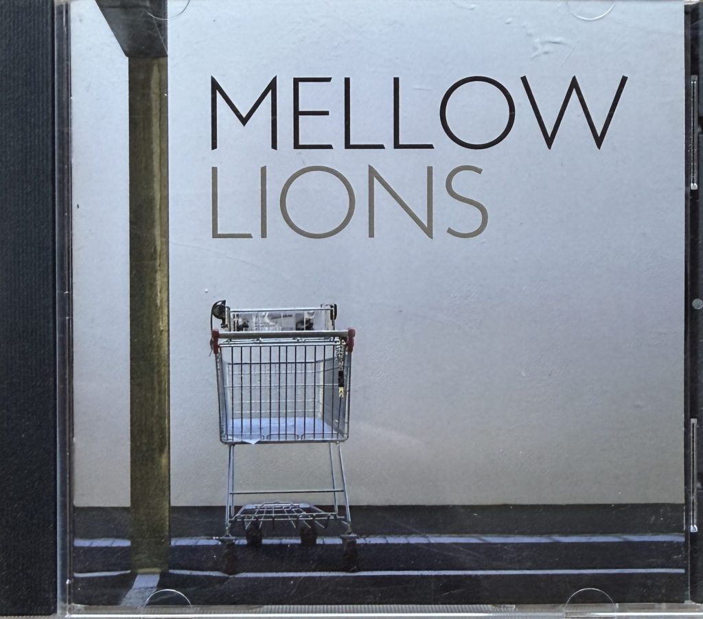 Mellow - Lions -Tracks: 1. The Continuing Story of the search for the end of the rainbow - 2.Lions - 3.Feed me - 4.Blood and tears - 5.Turn Around - 6,Pinning - 7.Bus Stop - 8.Digging for your soul -9.Interlude - 10.Hunt for blood - 11. Black Window - 12.Tonight - 13.Ball and chain - 14.Lions out